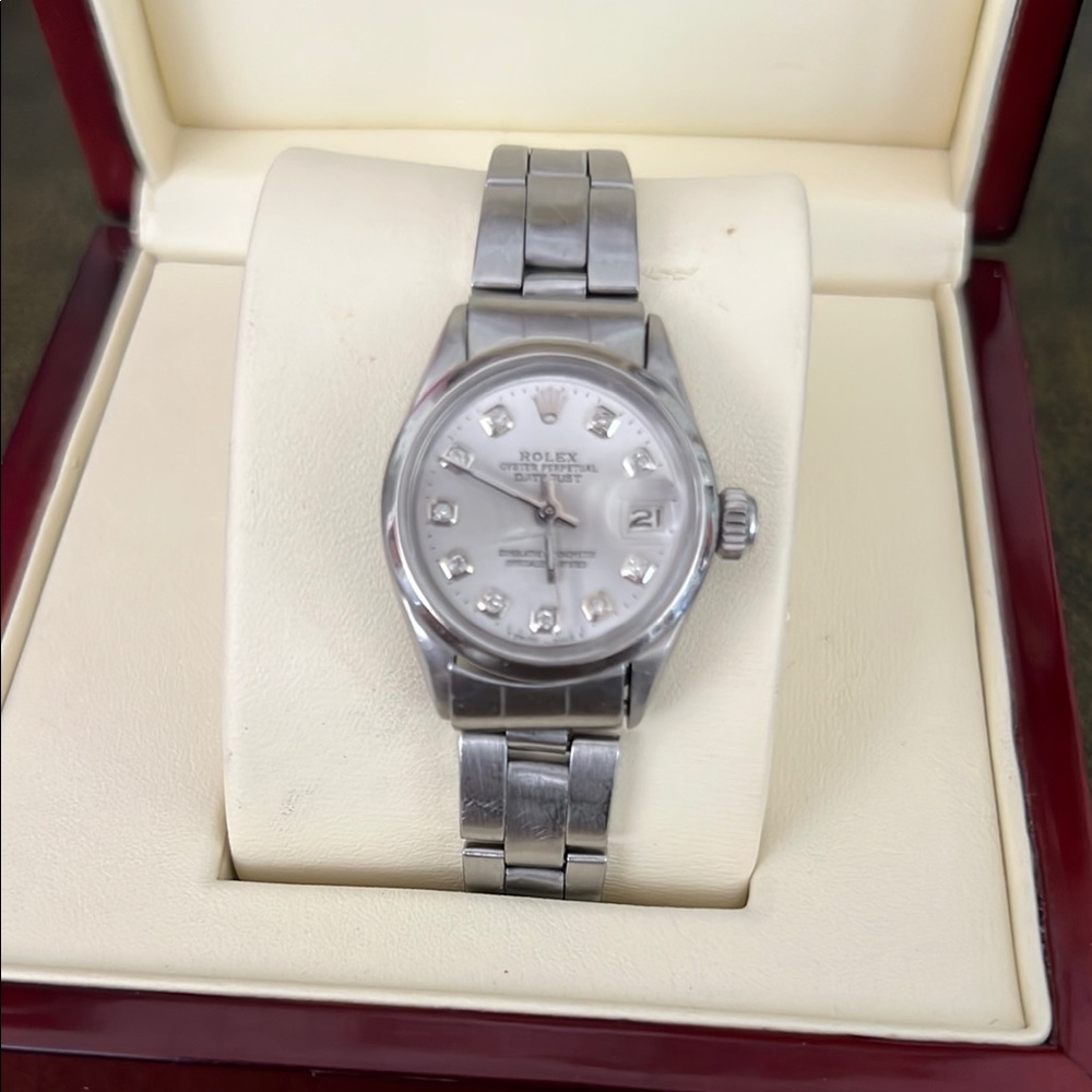 Rolex Women's Silver Watch with Diamond Accents